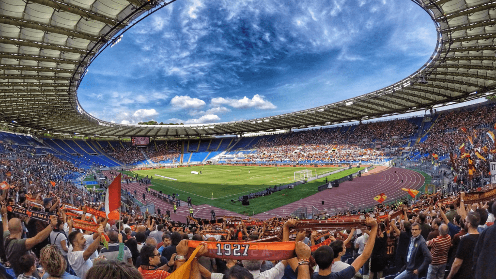 a large crowd watching a football game