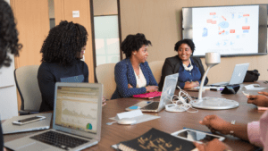 a group of people in the office