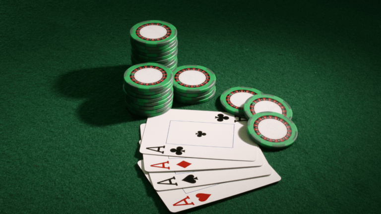 a playing card and a casino chips