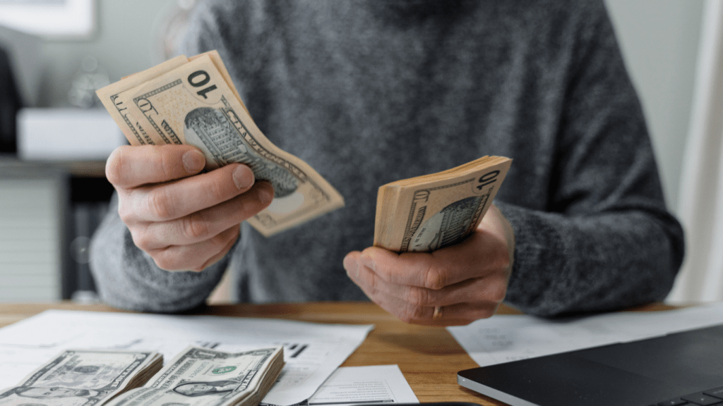 a person hand with money
