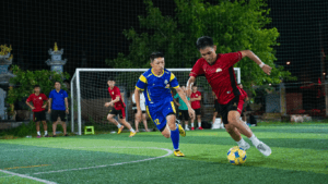 two soccer players in action on the field