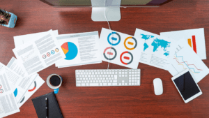 image of a computer table with a piece of paper