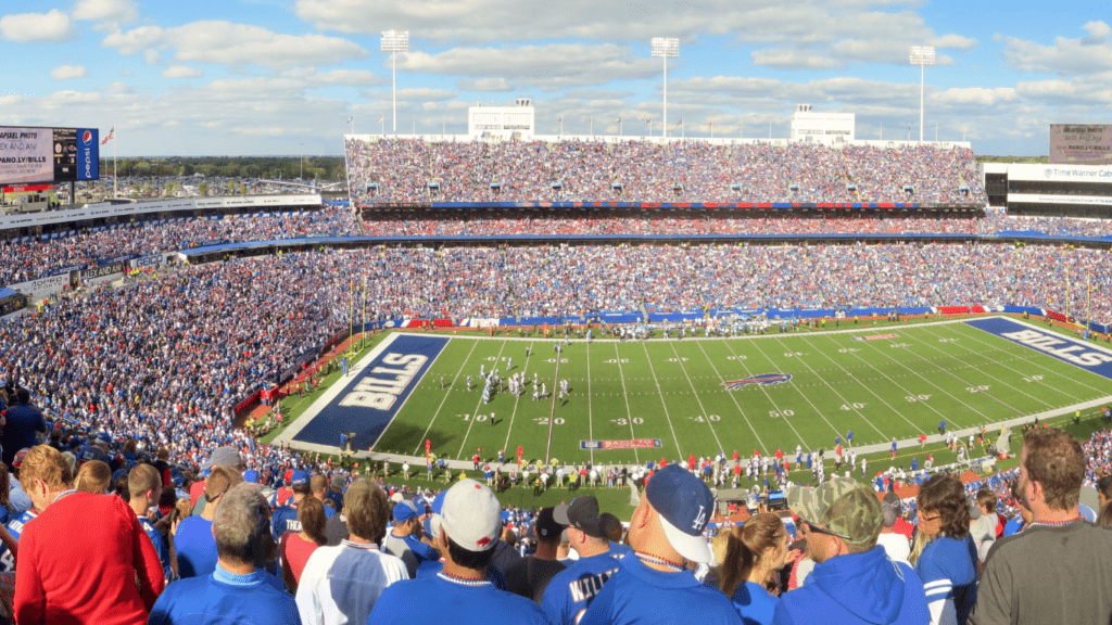 a large crowd watching a football game