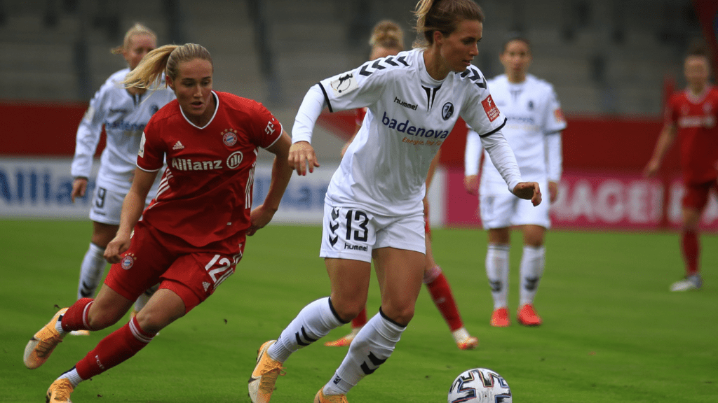 two soccer players in action on the field